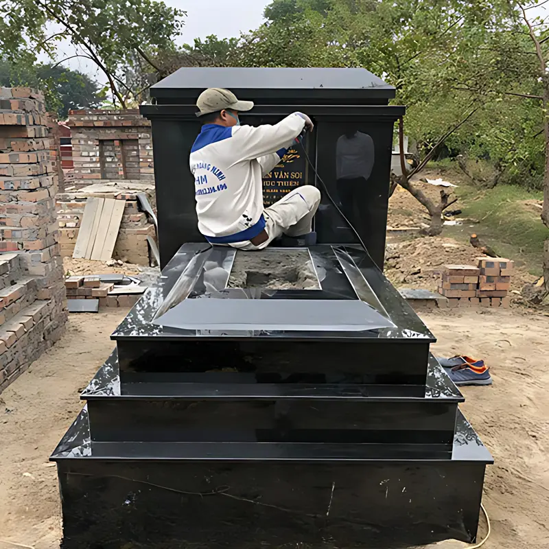 Mộ ốp đá Granite xanh, vân loang đều, đẹp, tạo nên sự sang trọng và trang nghiêm