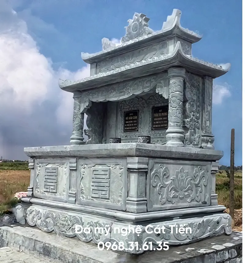 Đá mỹ nghệ Cát Tiến cung cấp sản phẩm mộ đôi đá xanh đen hai mái họa tiết hoa sen