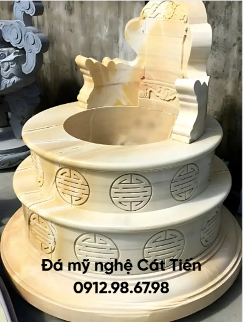 Đá mỹ nghệ Cát Tiến cung cấp mẫu mộ đá tròn chế tác từ đá vàng Nghệ An, chạm khắc hoa văn tỉ mỉ