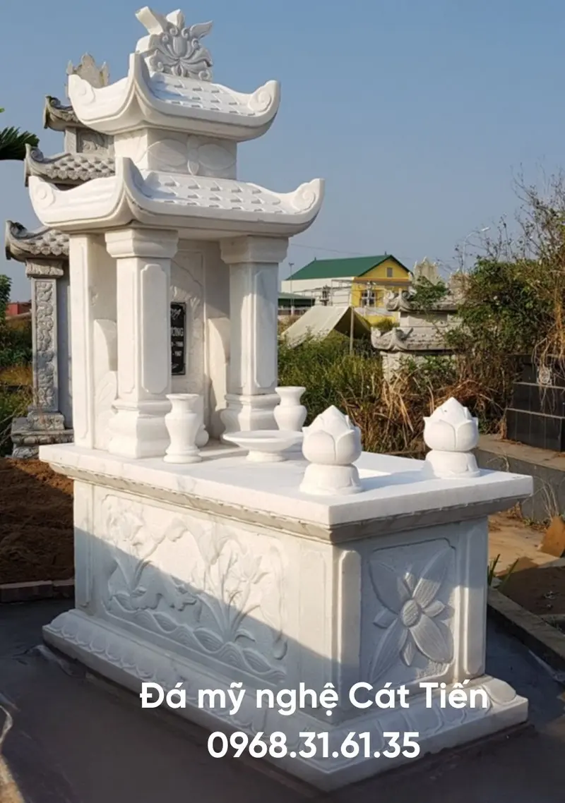 Đá mỹ nghệ Cát Tiến cung cấp sản phẩm Lăng mộ đá hai mái trắng, hình rồng và họa tiết truyền thống